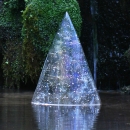 Cast glass bowed triangle