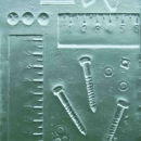 Cast of woodworkers tools in glass